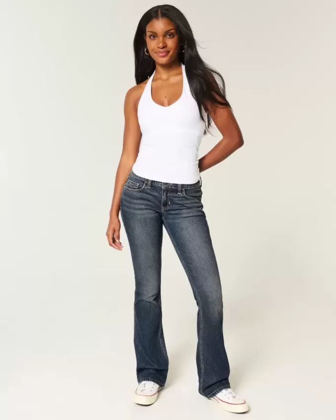 Jeans bootcut ricamati a vita bassa e lavaggio scuro