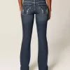 Jeans bootcut ricamati a vita bassa e lavaggio scuro