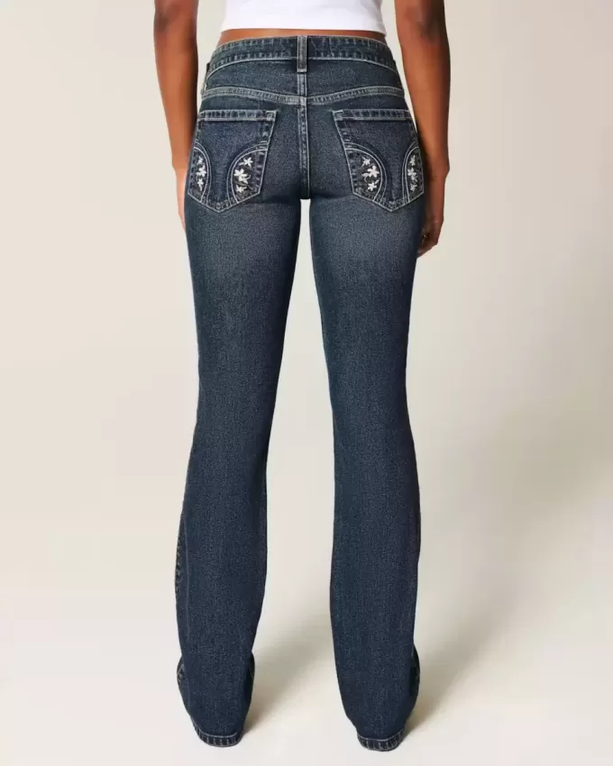 Jeans bootcut ricamati a vita bassa e lavaggio scuro