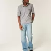Jeans bootcut rilassati con lavaggio medio
