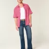 Jeans bootcut rilassati con lavaggio scuro