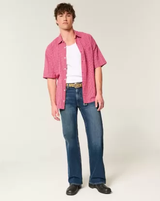 Jeans bootcut rilassati con lavaggio scuro