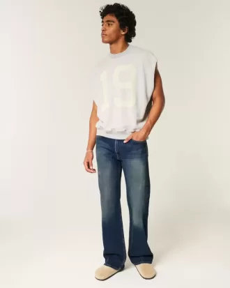 Jeans bootcut rilassati con lavaggio scuro