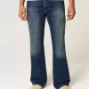 Jeans bootcut rilassati con lavaggio scuro