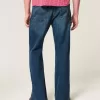 Jeans bootcut rilassati con lavaggio scuro