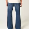 Jeans bootcut rilassati con lavaggio scuro