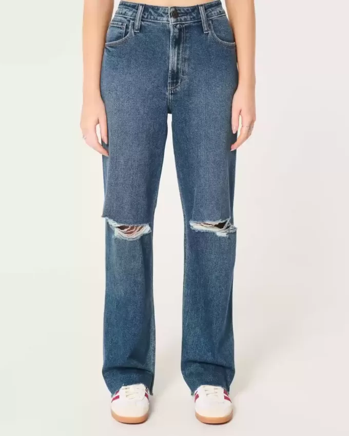 Jeans da papà strappati a vita altissima e lavaggio scuro
