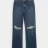 Jeans da papà strappati a vita altissima e lavaggio scuro