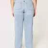 Jeans Dad Curvy a vita altissima e lavaggio chiaro con strappi