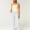 Jeans dritti a vita alta e lavaggio chiaro con effetto curvy