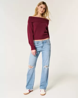 Jeans dritti e rilassati con lavaggio medio e strappi a vita bassa