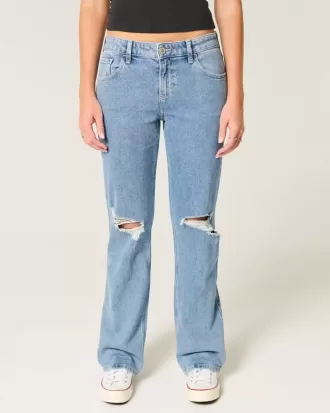 Jeans dritti e rilassati con lavaggio medio e strappi a vita bassa