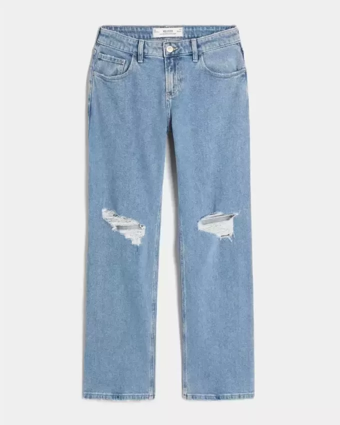 Jeans dritti e rilassati con lavaggio medio e strappi a vita bassa