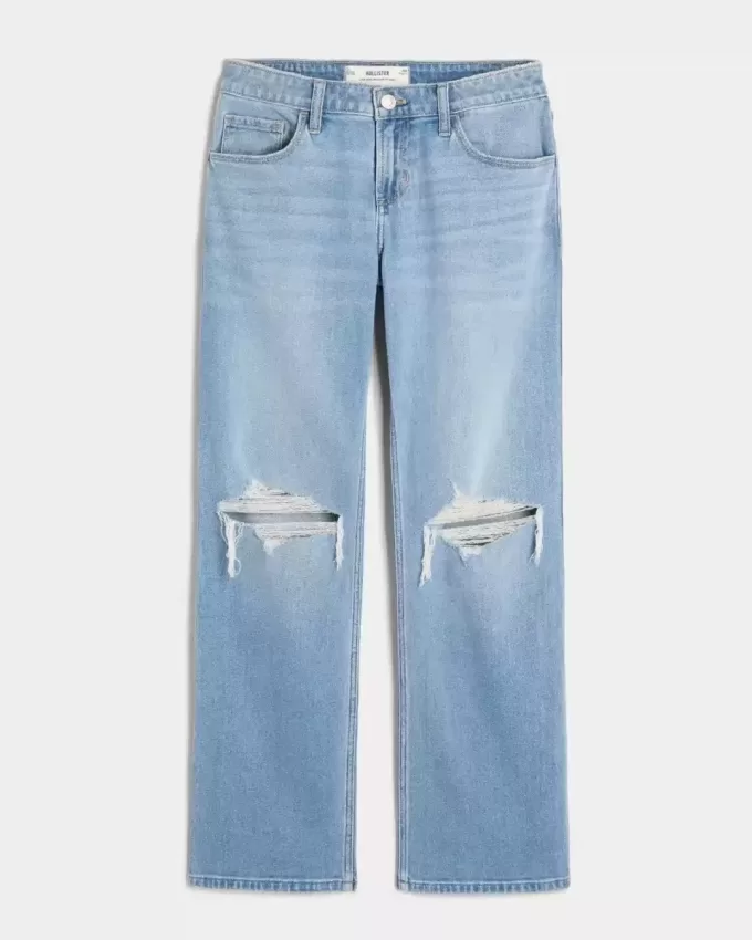 Jeans dritti e rilassati con lavaggio medio e strappi a vita bassa