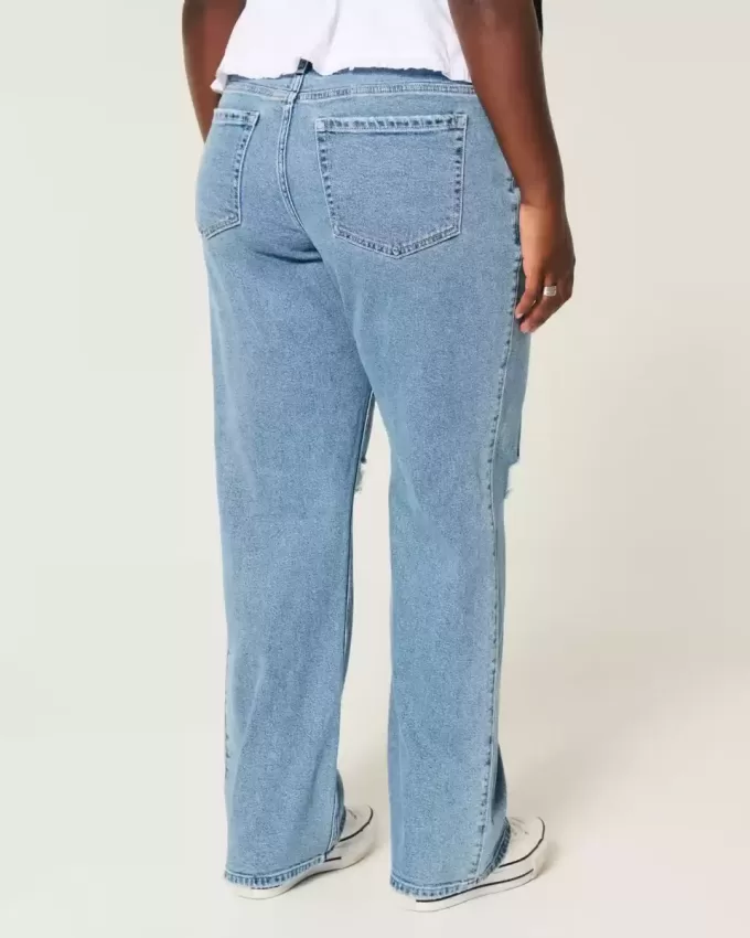 Jeans dritti e rilassati con lavaggio medio e vita bassa e strappi curvy