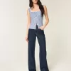 Jeans larghi a vita alta con lavaggio medio