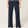 Jeans larghi a vita alta con lavaggio medio