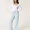 Jeans larghi a vita alta con lavaggio chiaro