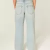 Jeans larghi a vita alta con lavaggio chiaro effetto consumato
