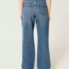 Jeans larghi a vita alta con lavaggio medio