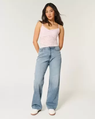 Jeans larghi a vita alta e lavaggio medio con effetto curvy