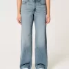 Jeans larghi a vita alta e lavaggio medio con effetto curvy