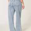 Jeans larghi a vita alta e lavaggio medio con effetto curvy