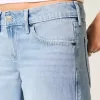 Jeans larghi a vita bassa con fiocchi borchiati e lavaggio chiaro