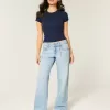 Jeans larghi a vita bassa con lavaggio chiaro