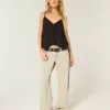 Jeans larghi a vita bassa con lavaggio chiaro