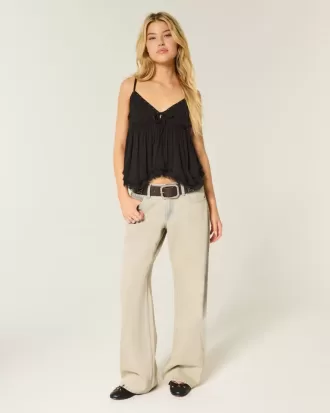 Jeans larghi a vita bassa con lavaggio chiaro