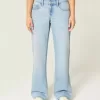 Jeans larghi a vita bassa con lavaggio chiaro