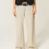 Jeans larghi a vita bassa con lavaggio chiaro