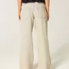Jeans larghi a vita bassa con lavaggio chiaro