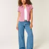 Jeans larghi a vita bassa con lavaggio medio