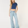 Jeans larghi a vita bassa con lavaggio medio