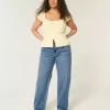 Jeans larghi a vita bassa con lavaggio medio