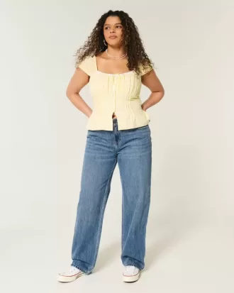 Jeans larghi a vita bassa con lavaggio medio