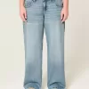 Jeans larghi a vita bassa con lavaggio medio