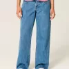 Jeans larghi a vita bassa con lavaggio medio