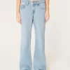 Jeans larghi a vita bassa con lavaggio medio
