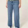 Jeans larghi a vita bassa con lavaggio medio