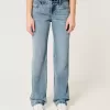 Jeans larghi a vita bassa con lavaggio medio