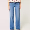 Jeans larghi a vita bassa con lavaggio medio
