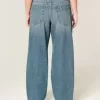 Jeans larghi a vita bassa con lavaggio medio