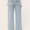 Jeans larghi a vita bassa con lavaggio medio