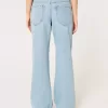 Jeans larghi a vita bassa con lavaggio medio