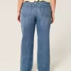 Jeans larghi a vita bassa con lavaggio medio