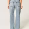 Jeans larghi a vita bassa con lavaggio medio