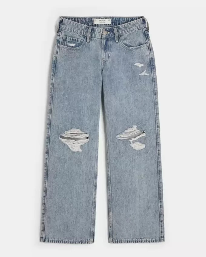 Jeans larghi a vita bassa con lavaggio medio e strappi